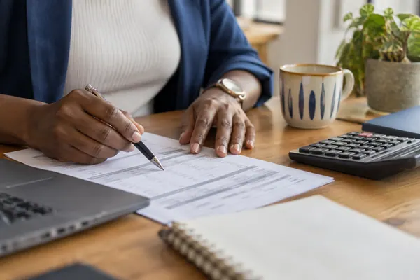 Employee checking the rows on a payslip